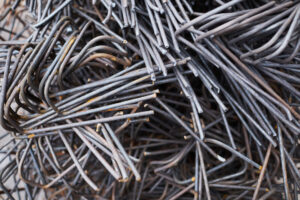 Metal Wire Background Background image of metal scraps at construction site, copy space
